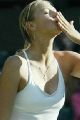 Maria Sharapova at Wimbledon 2004. A happy winner blowing a kiss to the spectators